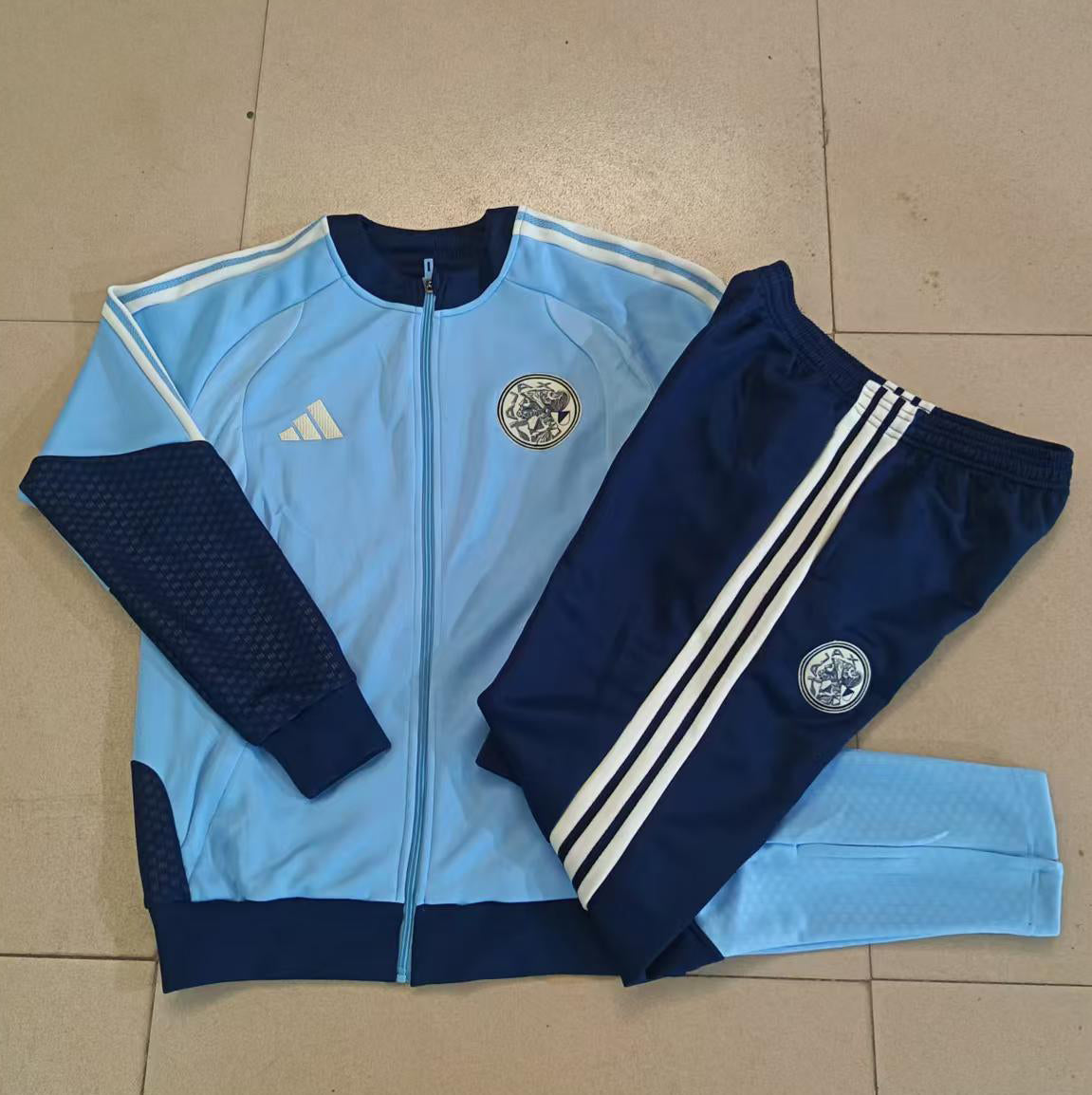 Ajax 2026/27 Light Blue & Navy Kids Full-Zip Training Suit - supplier set view 1