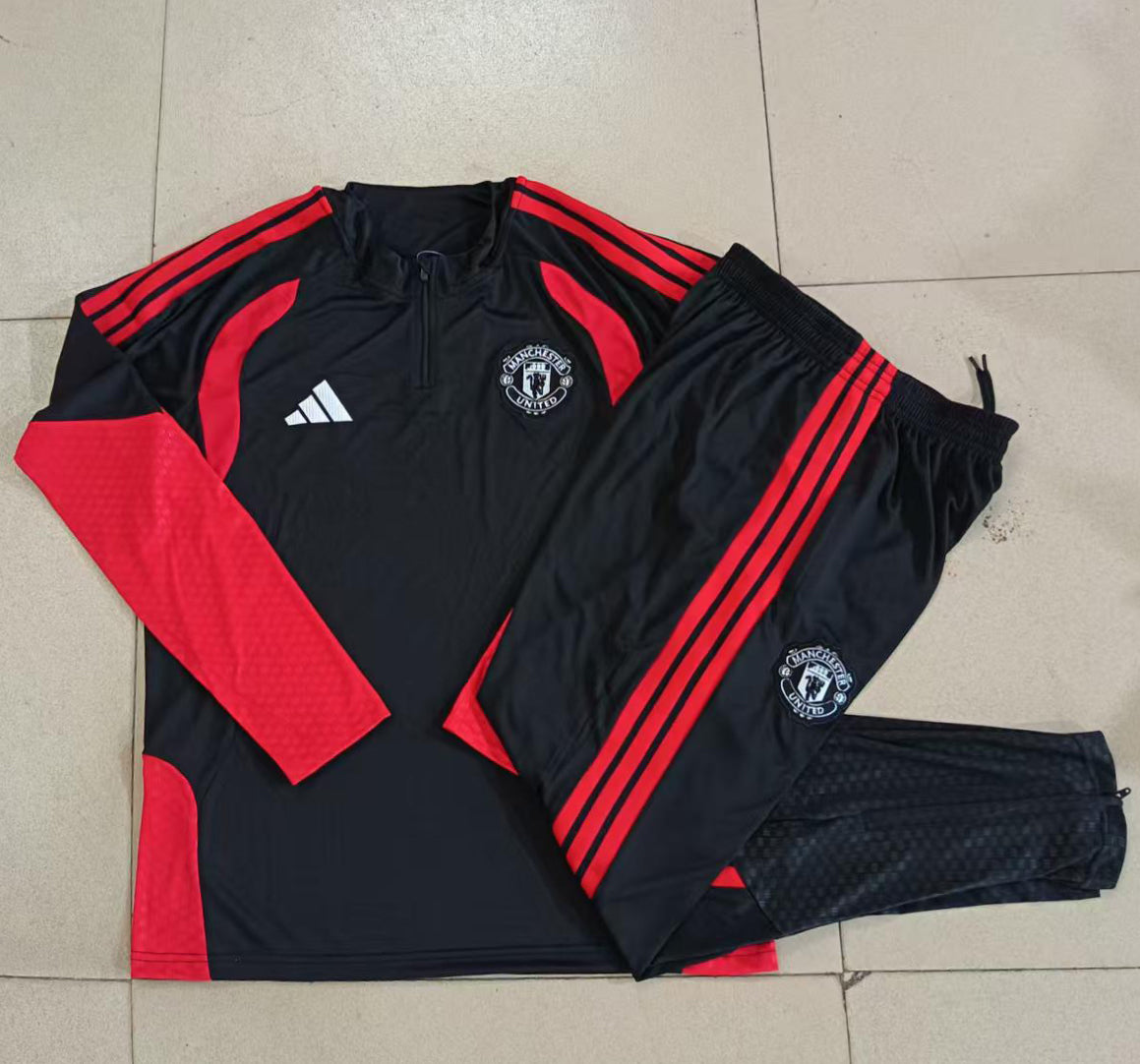 Manchester United 2026/27 Black & Red Kids Half-Zip Training Suit - supplier set view 1
